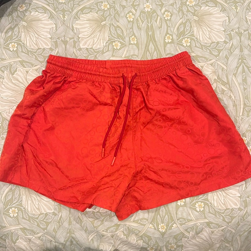 Outdoor Voices orangey red shorts